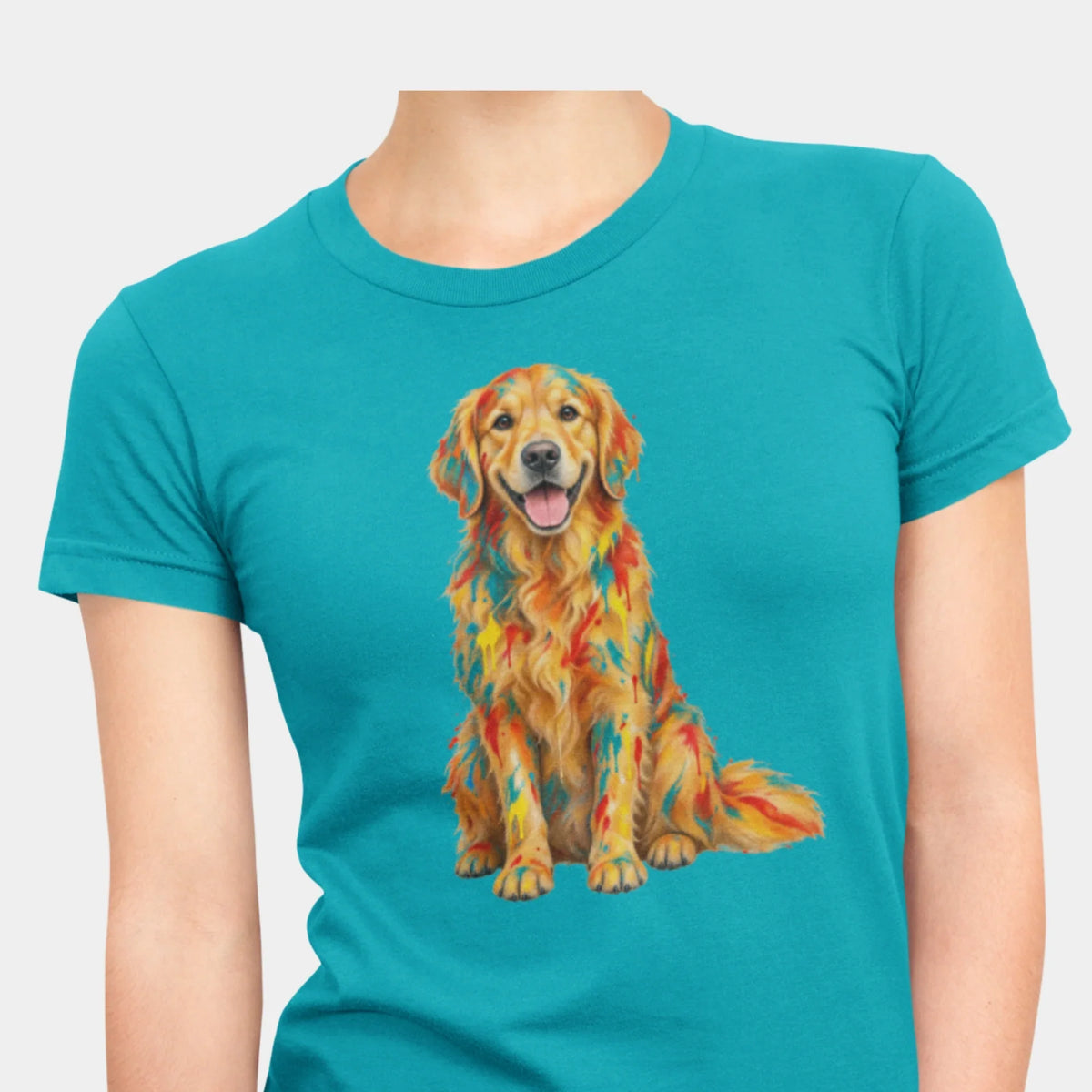 A woman wearing a tropical blue short-sleeve crewneck t-shirt with a colorful graphic print of a Golden Retriever dog on the front.