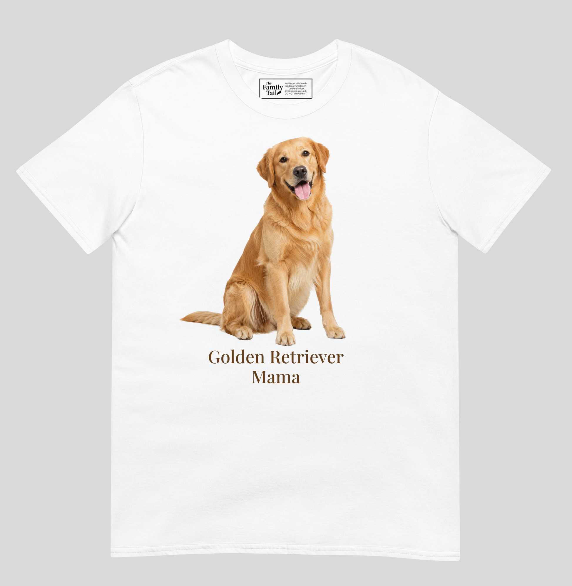 A white short-sleeve crewneck t-shirt featuring a graphic print of a golden retriever dog sitting above the text 'Golden Retriever Mama' in a dark brown font on a light gray background.