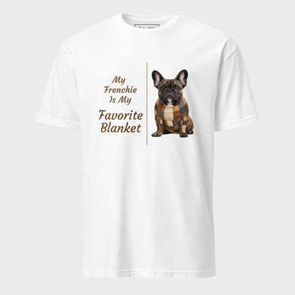 A white short-sleeve crewneck t-shirt featuring a graphic print of a French Bulldog wearing a brown and tan plaid blanket next to the text 'My Frenchie Is My Favorite Blanket' in brown lettering, displayed on a light gray background.