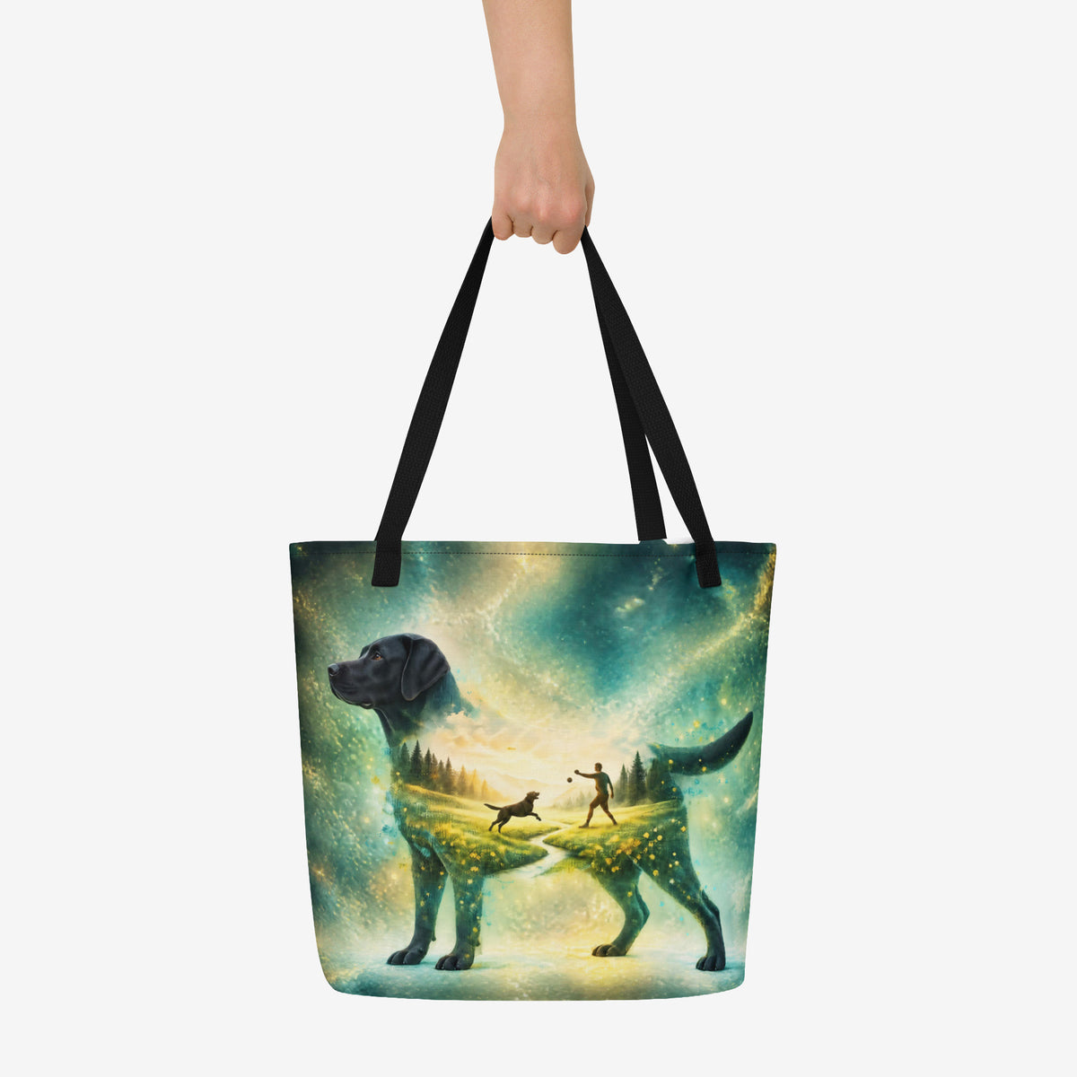 Black Labrador Retriever tote with double-exposure artwork of a person playing fetch beneath a glowing teal and gold sky.


